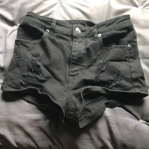 Black ripped shorts